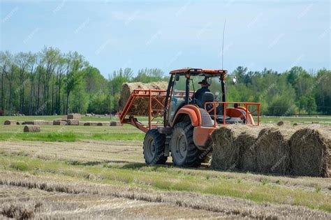 moving hay bales skid steer|hay and forage skid steer.